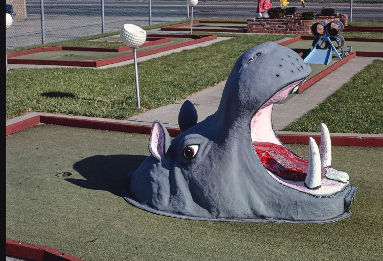 A giant open-mouthed hippo on the course at Mauro's mini golf in Hazel Park, Michigan.